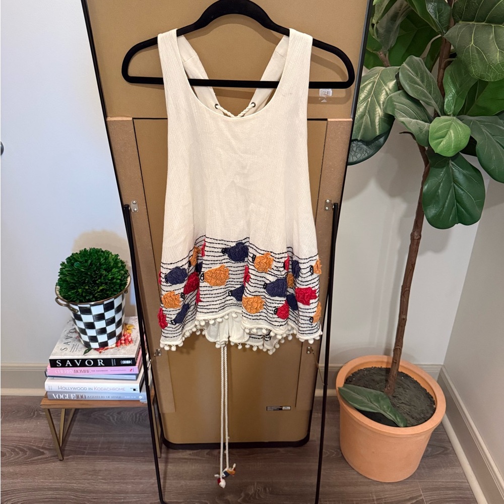 Embroidered Sleeveless Top with Pom Pom Hem